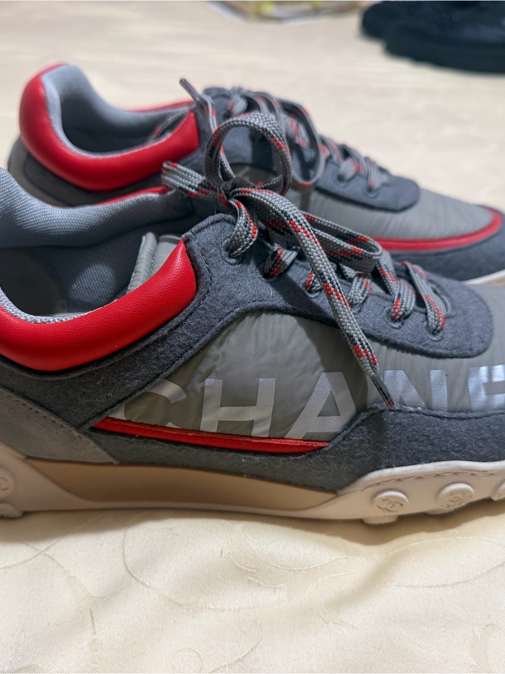 CHANEL Gray and Red Logo Low-Top Sneakers
